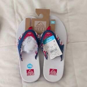 Reef White Flip Flops with Blue & Red Straps